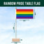 Rainbow pride table flag with dimensions on a blue background