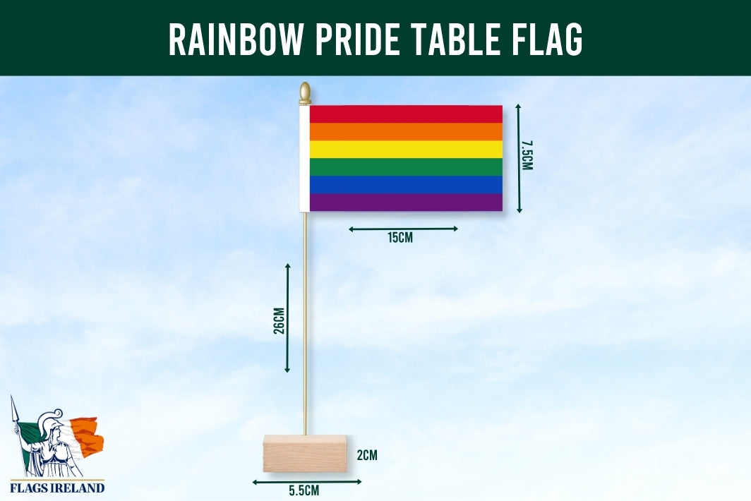 Rainbow pride table flag with dimensions on a blue background