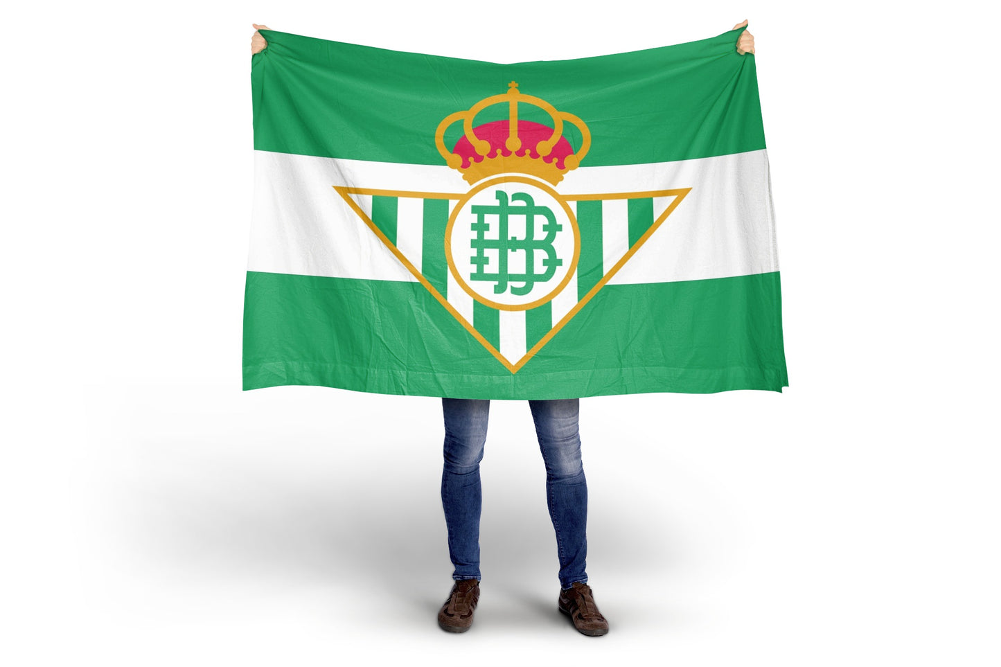 Person holding a green and white flag with a Real Betis crest on a white background