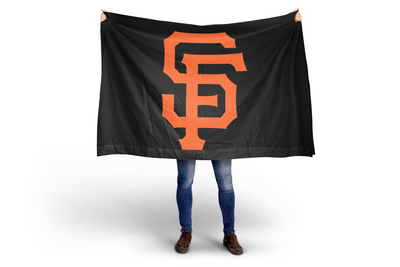 Person holding a black flag with an orange 'SF' logo on a white background