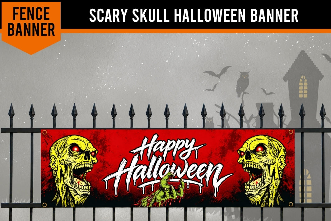 A Halloween-themed fence banner featuring two yellow zombie faces on the sides and white dripping text reading 'Happy Halloween' on a red background, shown hanging in front of a black metal fence with a spooky house and bats in the background.