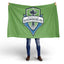 Person holding a green Seattle Sounders FC flag against a white background