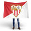 Person holding a Sevilla FC red and white flag with a prominent emblem on a white background