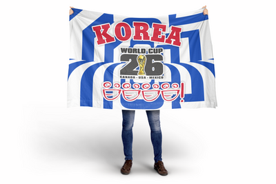 Person holding a large flag with 'Korea' and World Cup 2026 branding on a white background