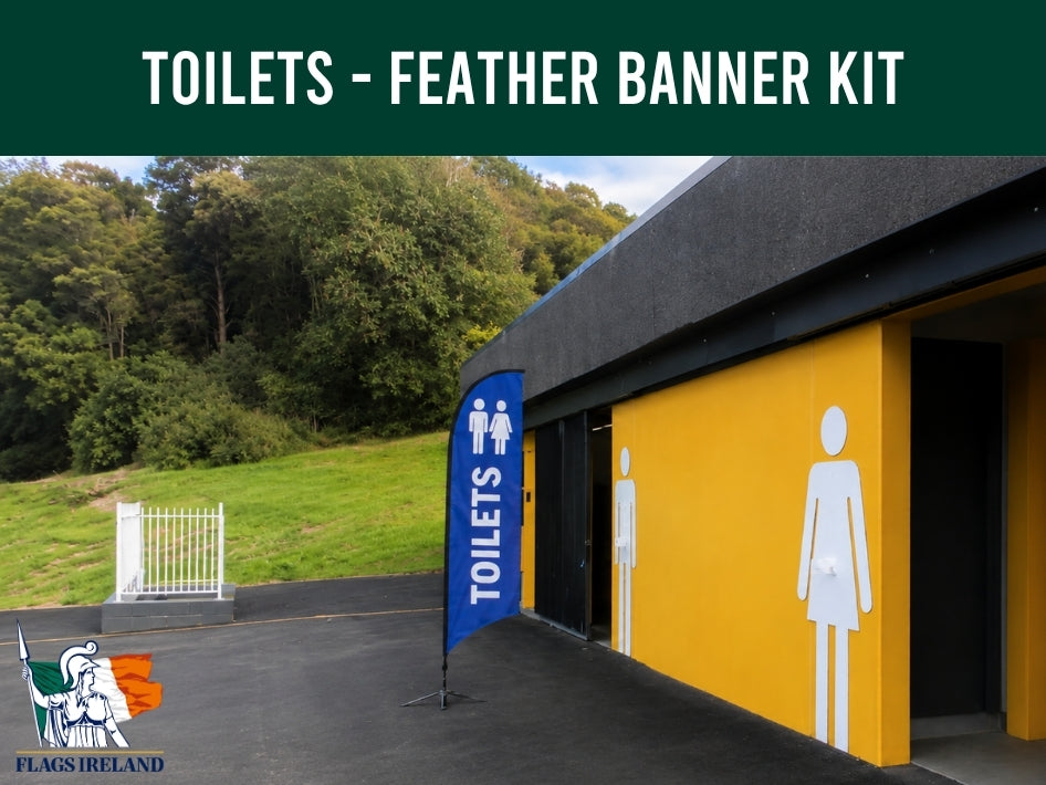 Outdoor toilet with a blue feather banner displaying 'TOILETS' 'men and woman image.