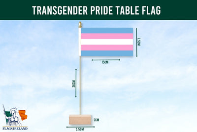 Transgender pride table flag with dimensions on a blue background