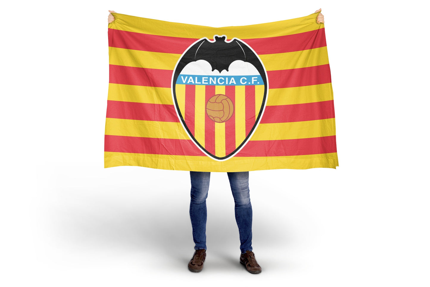 Person holding a Valencia C.F. flag with red and yellow stripes and a logo.