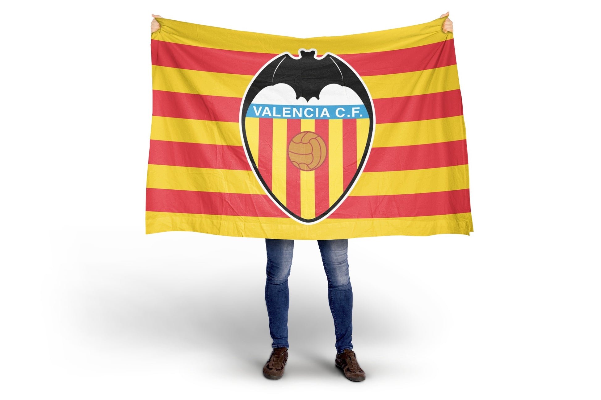 Person holding a Valencia C.F. flag with red and yellow stripes and a logo.