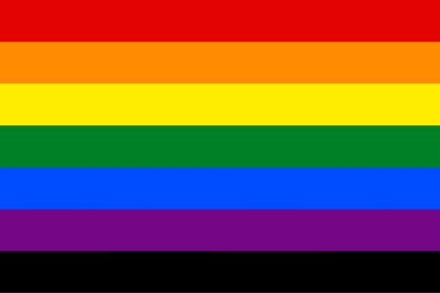 Rainbow flag with six horizontal stripes in red, orange, yellow, green, blue, and purple on a black background. Victory Over Aids Pride Flag