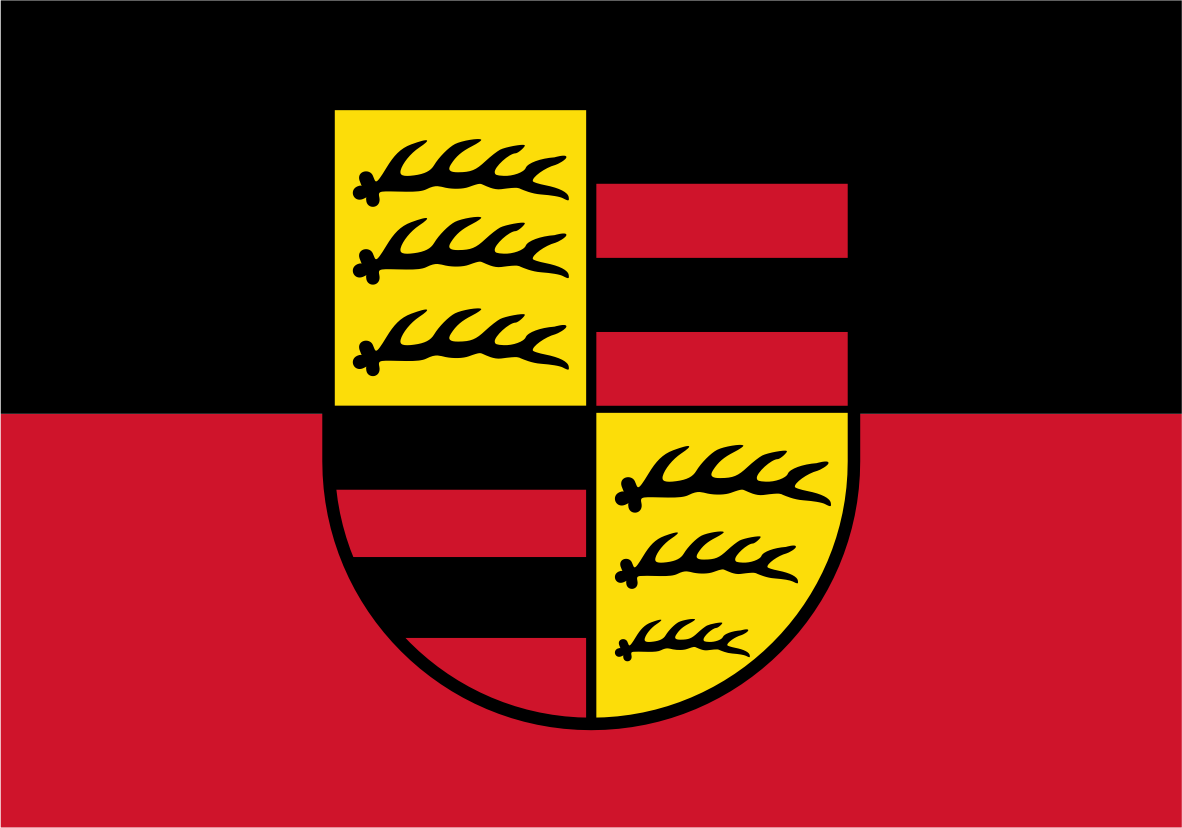 The flag of Württemberg-Hohenzollern is a simple black and dark red two-color flag. It was used from 1947 to 1952 in a post-World War II region of Germany. The black honors the former Prussian province of Hohenzollern, and the dark red honors the state of Württemberg.
