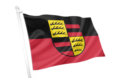 A Wurttemberg Hohenzollern waving flag on a white pole, featuring a black upper half and red lower half with a central black-and-yellow heraldic shield.