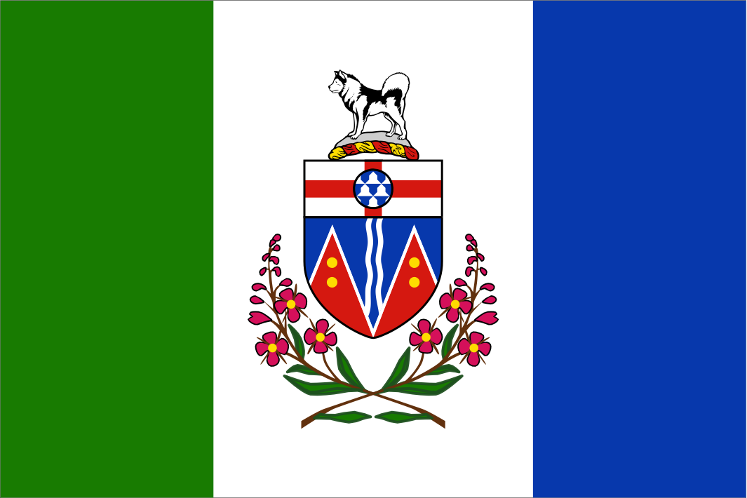 Flag with a coat of arms and floral elements on a green, white, and blue background. Yukon Flag.