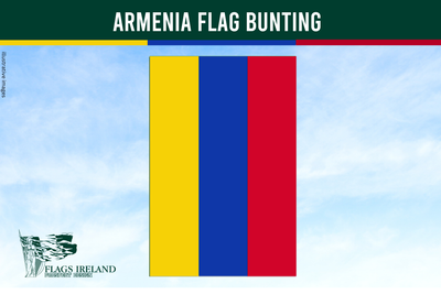 Armenia flag bunting with three vertical stripes in yellow, blue, and red on a blue sky background.