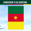 cameroon flag bunting, green red and yellow with a star in the middle on a blue sky