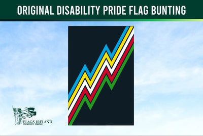 Original Disability Pride Flag Bunting with colorful zigzag pattern on a blue sky background, featuring the Flags Ireland logo.